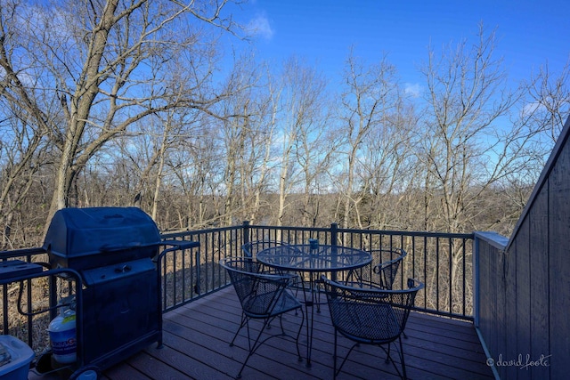 wooden deck featuring grilling area