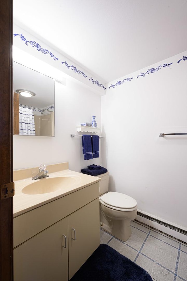 bathroom with vanity, toilet, curtained shower, and a baseboard heating unit