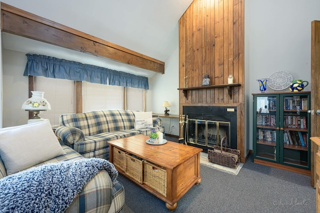 living room featuring vaulted ceiling with beams and dark carpet