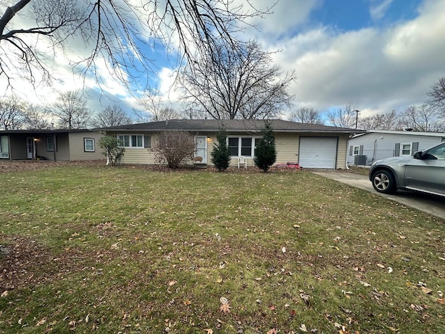 single story home with a front lawn and a garage