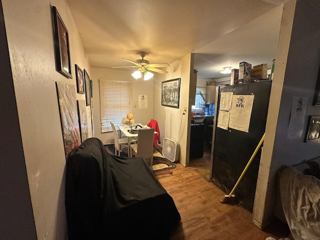 interior space with light hardwood / wood-style floors and ceiling fan