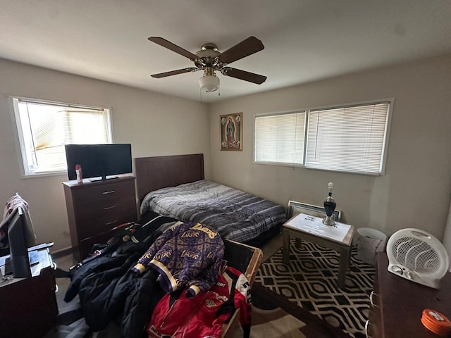 bedroom featuring ceiling fan