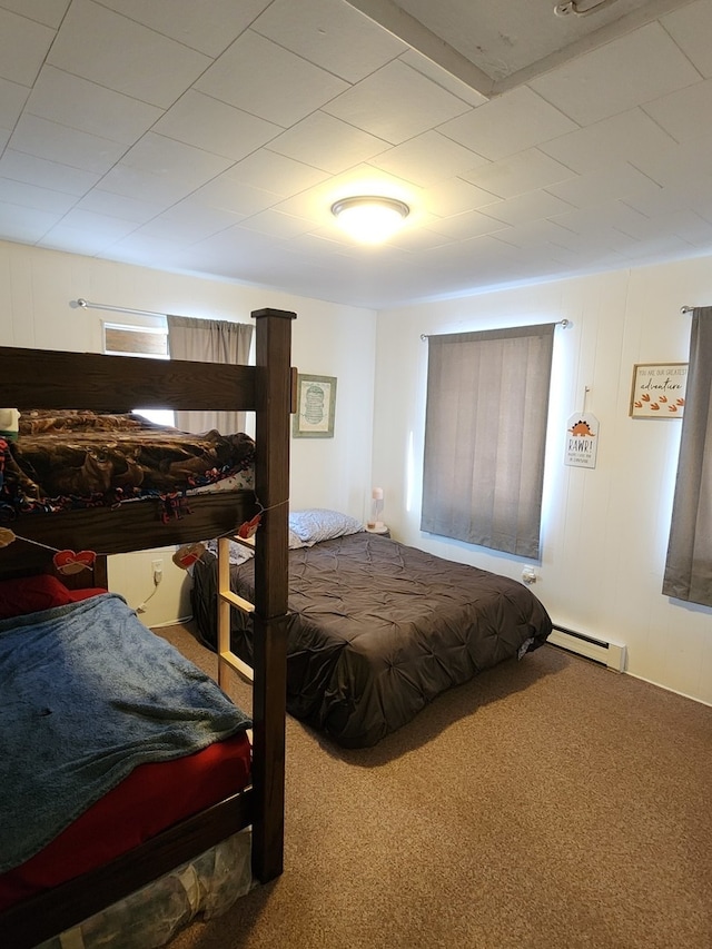 bedroom with carpet flooring and baseboard heating