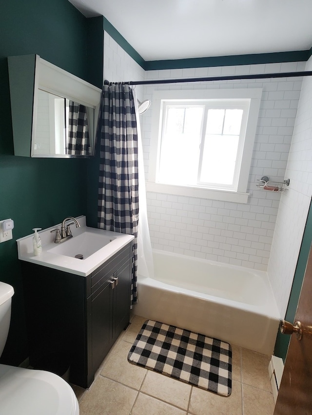 full bathroom featuring tile patterned flooring, shower / bath combo, toilet, and baseboard heating