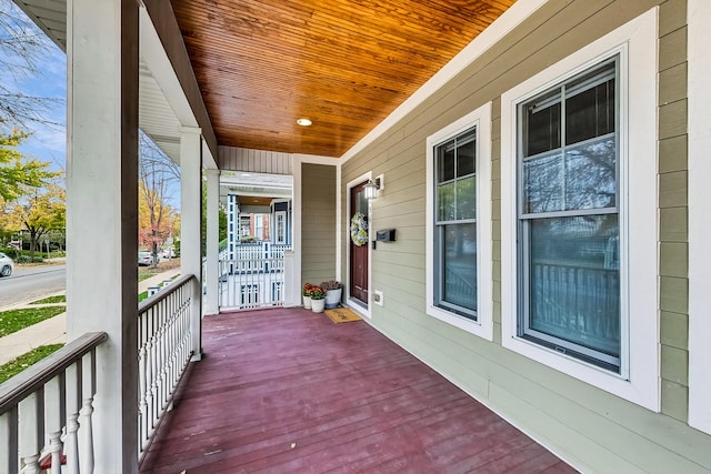 wooden terrace with covered porch