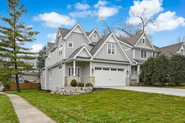 craftsman house featuring central AC, a garage, and a front lawn