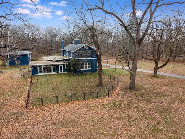 exterior space featuring a front yard