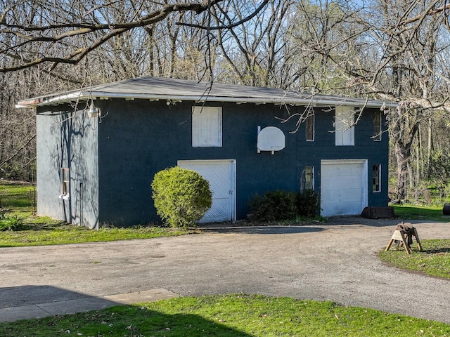 exterior space with a garage