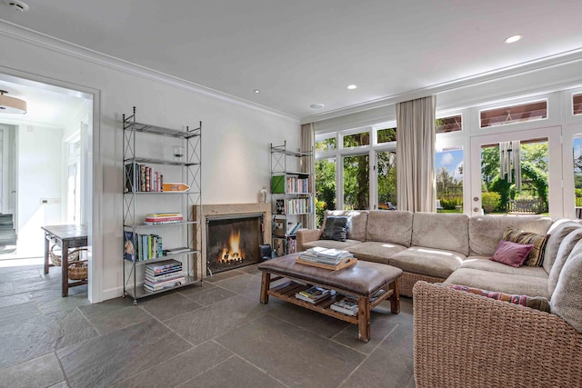 living room featuring crown molding