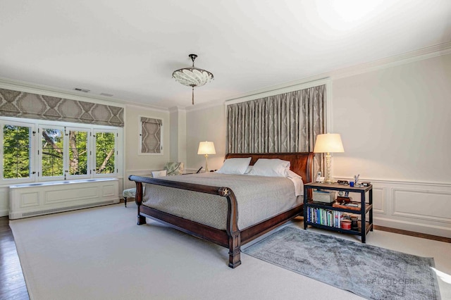 bedroom with crown molding