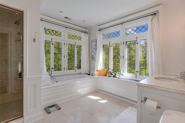 bathroom with tile patterned flooring, vanity, independent shower and bath, and french doors