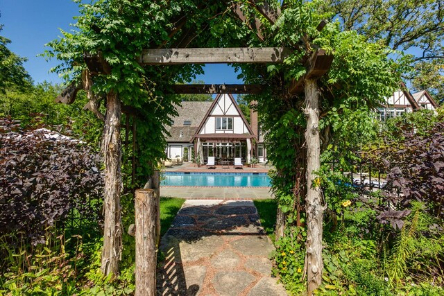 view of pool featuring a patio