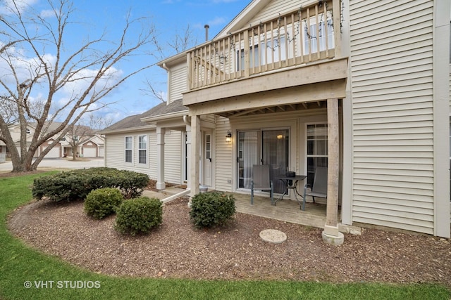 property entrance with a balcony