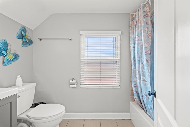 full bathroom with shower / bath combo, tile patterned flooring, lofted ceiling, toilet, and vanity