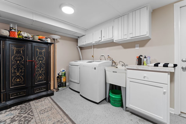 laundry room with cabinets and independent washer and dryer