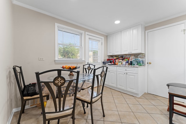 tiled dining area with crown molding