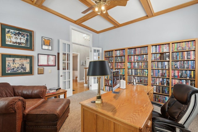 office space featuring a high ceiling, coffered ceiling, ceiling fan, beam ceiling, and french doors