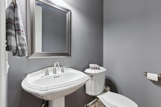 bathroom with sink and toilet