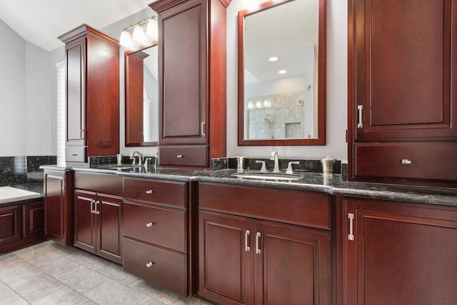 bathroom with vanity, shower with separate bathtub, and tile patterned flooring