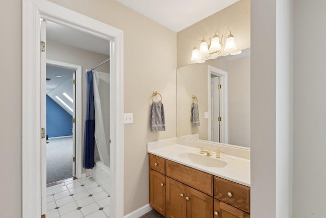 bathroom featuring vanity, lofted ceiling, and shower / tub combo