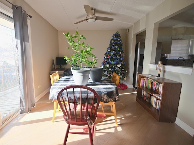 interior space with light wood-type flooring and ceiling fan