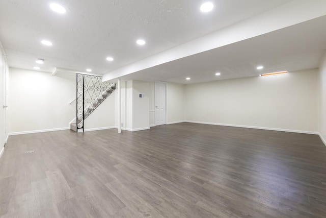 basement featuring dark wood-type flooring