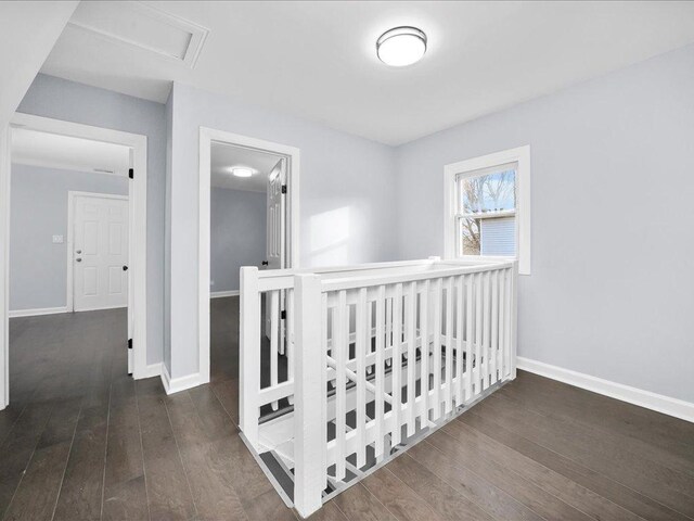 bedroom with dark wood-type flooring