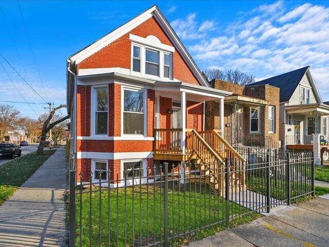 view of front of home with a front yard