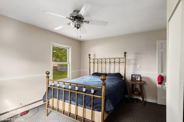 bedroom with a baseboard heating unit, ceiling fan, and carpet floors