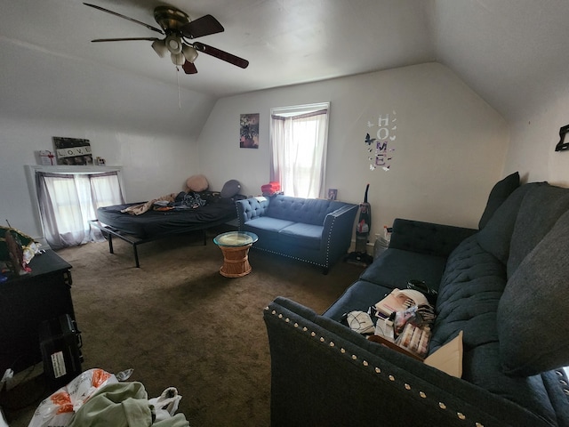 carpeted living room with ceiling fan and vaulted ceiling