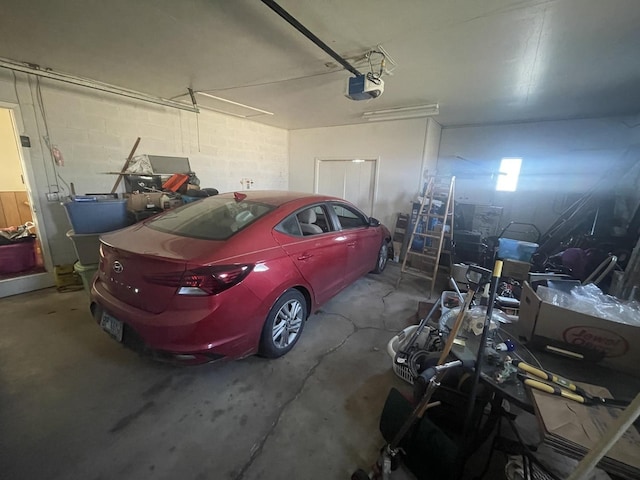 garage featuring a garage door opener