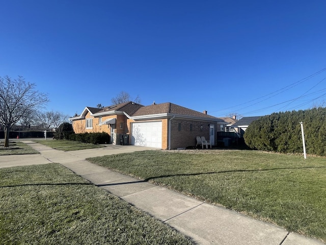 view of home's exterior featuring a lawn and a garage