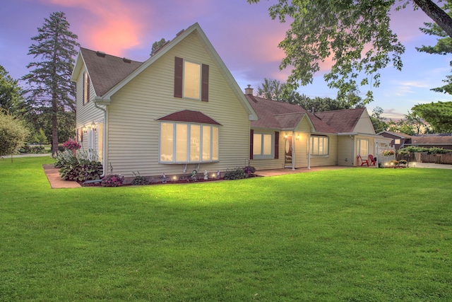 view of front facade with a lawn