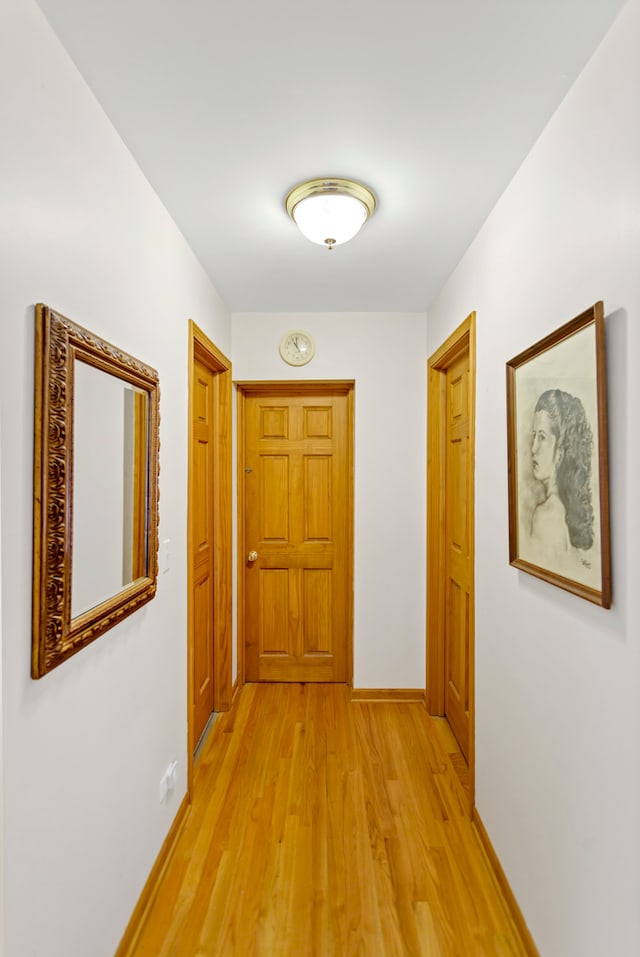 hallway featuring light hardwood / wood-style floors