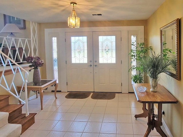 view of tiled entrance foyer