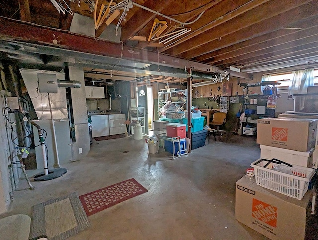 basement featuring independent washer and dryer