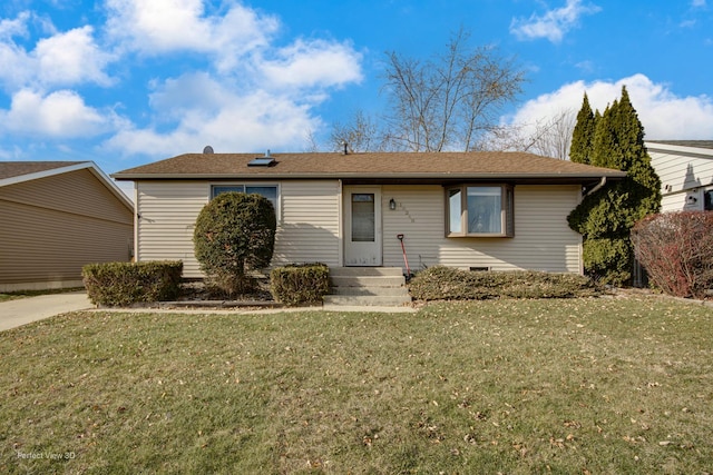 single story home featuring a front yard