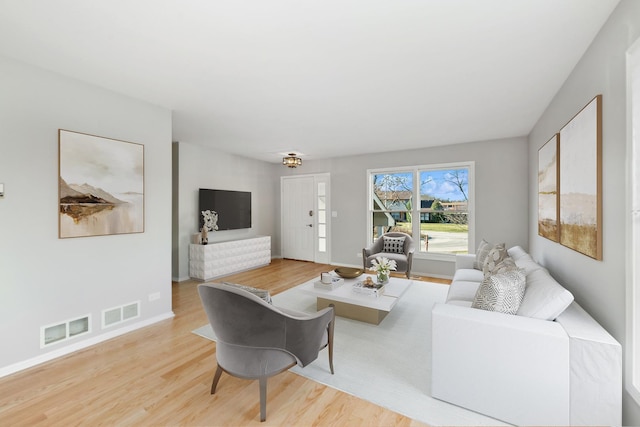 living room with wood-type flooring