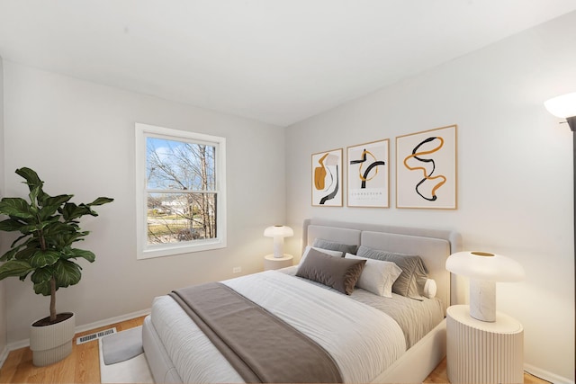 bedroom featuring light wood-type flooring