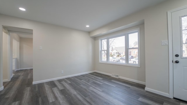 foyer featuring dark hardwood / wood-style floors