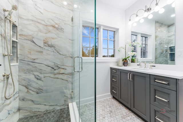 bathroom with vanity and walk in shower