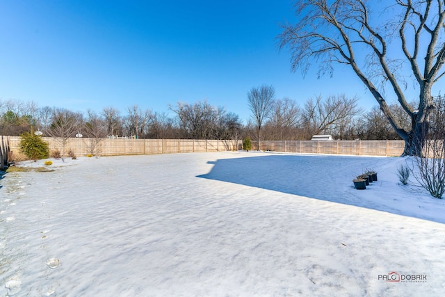 view of snow covered pool