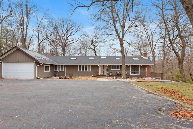 ranch-style home with a garage