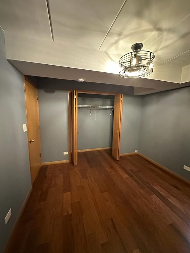 basement with wood-type flooring