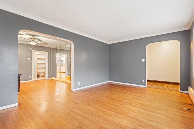 unfurnished room with ceiling fan, light hardwood / wood-style floors, and ornamental molding