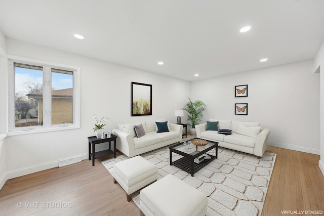 living room featuring light wood-type flooring