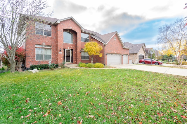 view of front of house featuring a front lawn and a garage