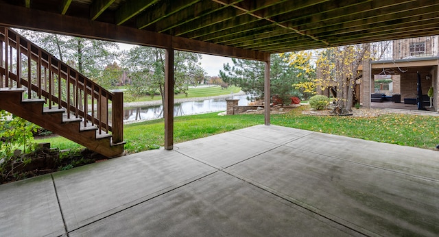 view of patio / terrace featuring a water view