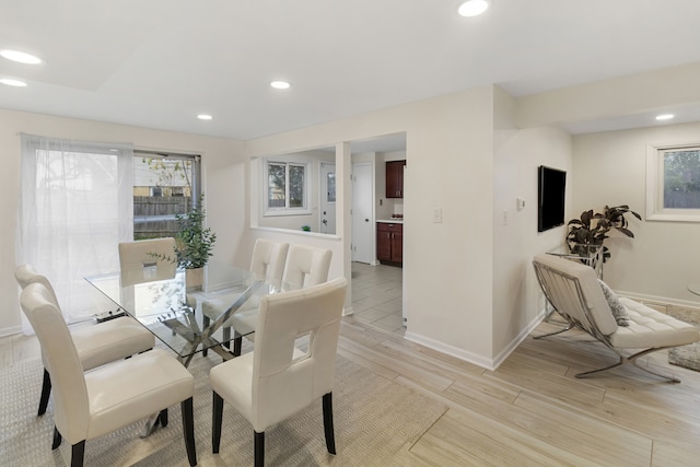 dining room featuring light hardwood / wood-style flooring