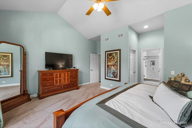 bedroom featuring ensuite bathroom, ceiling fan, light carpet, and high vaulted ceiling